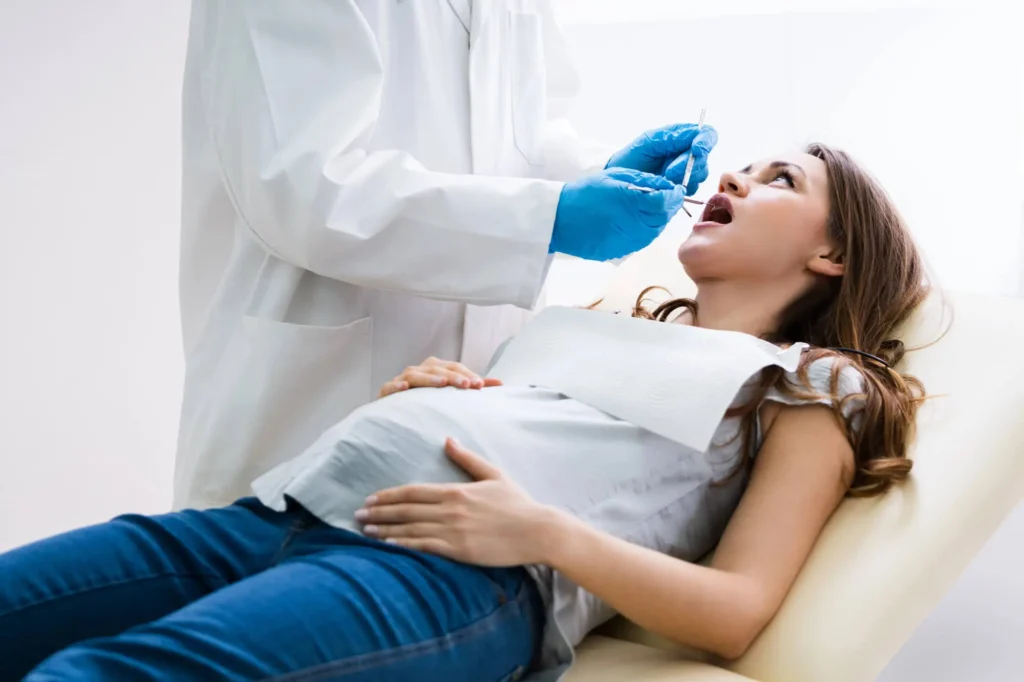 Pregnant Woman Learning About Sedation Dentistry in Maryland