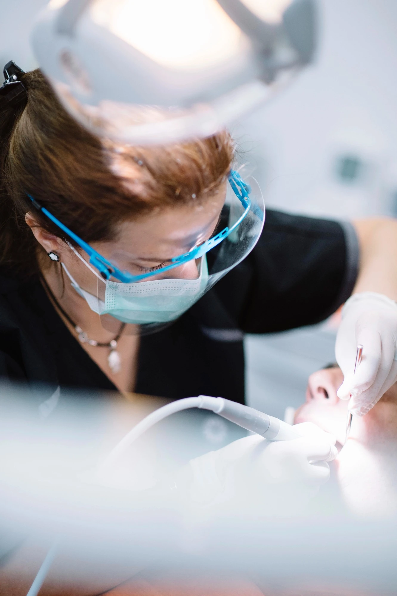 oral surgery laurel oral surgeon performing treatment